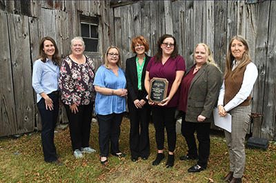 Bassett HealthCare Network’s New York Center for Agricultural Medicine and Health (NYCAMH) accepting the Excellus BCBS Circle of Excellence Award