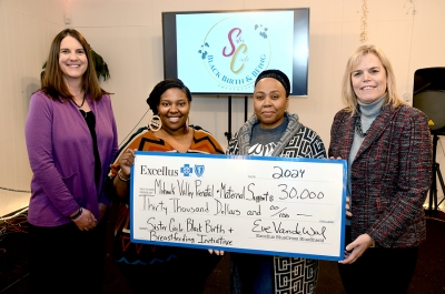 Representatives from Excellus BlueCross BlueShield present a $30,000 Health Equity Innovation Award to Mohawk Valley Prenatal & Maternal Support to help fund their Sister Circle: Black Birth & Breastfeeding Initiative program.