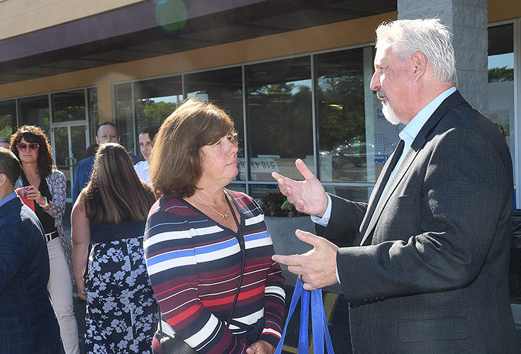 Tony Vitagliano speaks with a community member